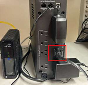 image of router power connected to battery backup