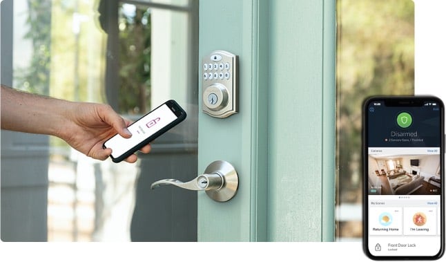 homelife security and automation hand holding mobile phone in front of door to unlock door and inset of mobile with homelife app on screen.jpg